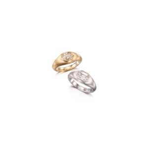 two chunky diamond rings in yellow and white gold